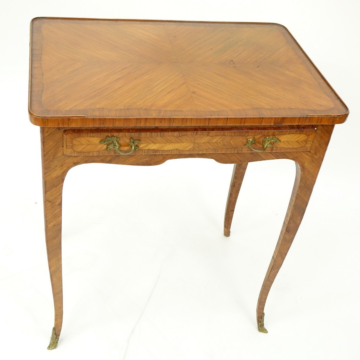 19th Century French Kingwood Inlaid Side Table with Gilt Bronze Mounts. Large sliding drawer and stands on tapering cabriole legs.