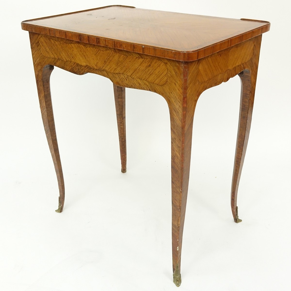 19th Century French Kingwood Inlaid Side Table with Gilt Bronze Mounts. Large sliding drawer and stands on tapering cabriole legs.