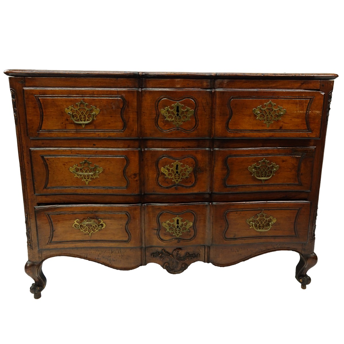 19th Century French Carved Walnut Commode/Chest of Drawers with Bronze Pulls. Three large fitted drawers and stands on front cabriole and rear bracket legs.