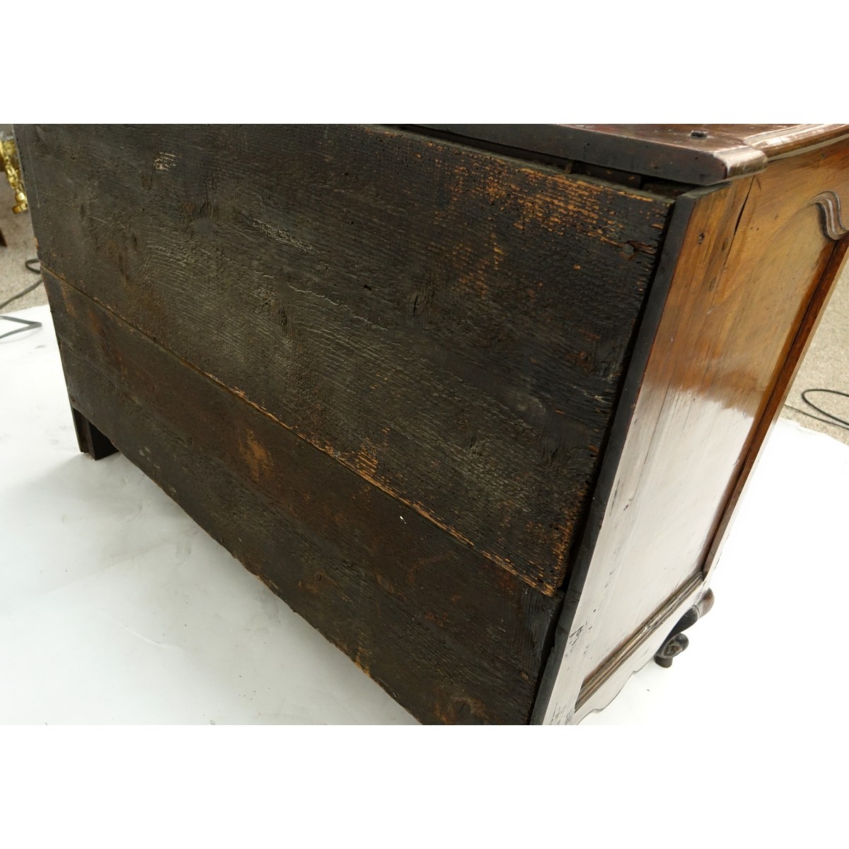 19th Century French Carved Walnut Commode/Chest of Drawers with Bronze Pulls. Three large fitted drawers and stands on front cabriole and rear bracket legs.