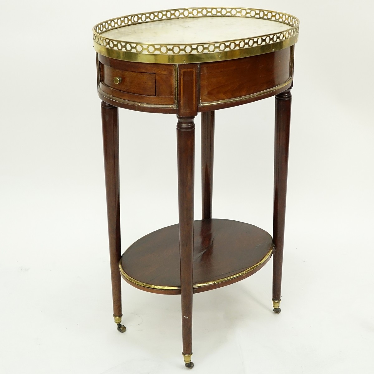 Early 20th Century French Gilt Bronze Mounted Occassional Table with Gallery. Two flanked drawers with top sliding platform.