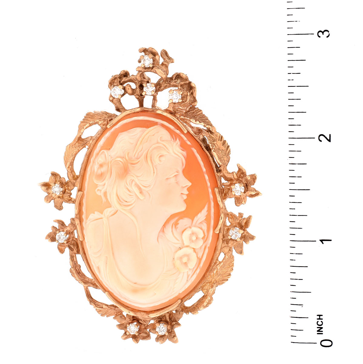 Carved Shell Cameo, Round Brilliant Cut Diamond and 14 Karat Yellow Gold Brooch. Unsigned.