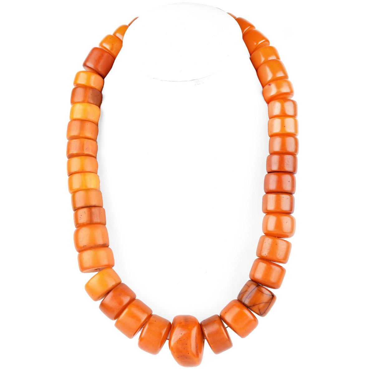 Large Antique Graduated Amber Beaded Necklace, Possibly Tibetan. Natural deep color tones with typical stress lines to a few beads overall good condition.