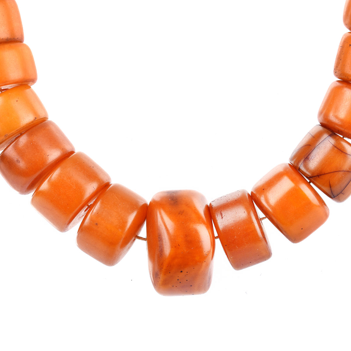 Large Antique Graduated Amber Beaded Necklace, Possibly Tibetan. Natural deep color tones with typical stress lines to a few beads overall good condition.