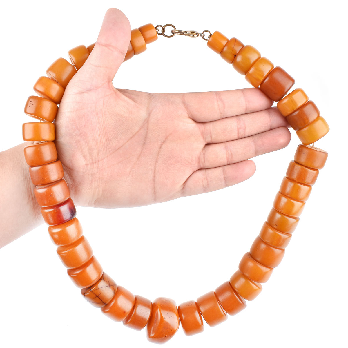 Large Antique Graduated Amber Beaded Necklace, Possibly Tibetan. Natural deep color tones with typical stress lines to a few beads overall good condition.