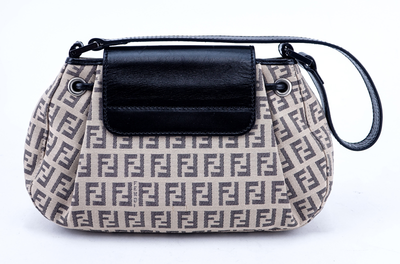 Fendi Beige Monogram Zucca Canvas Borsa Piccola Handbag. Black leather straps and flap closure with Rhutenium hardware.