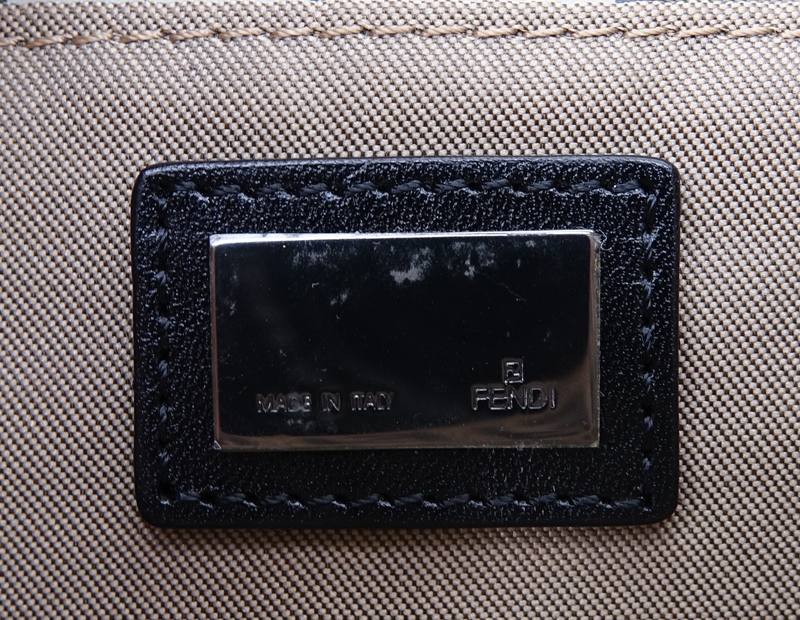 Fendi Beige Monogram Zucca Canvas Borsa Piccola Handbag. Black leather straps and flap closure with Rhutenium hardware.
