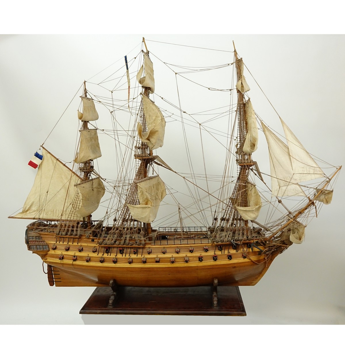 Antique French Wood Model Sailing Ship On Figural Stand. Well done and extremely detailed.