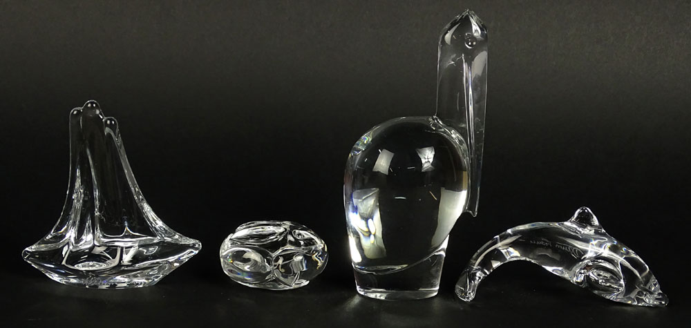 Lot of four (4) Crystal Animal Figurines. Includes Baccarat Pelican, 6-1/2 Inches; Daum France Sailboat; Daum Dolphin; Steuben Bunny.