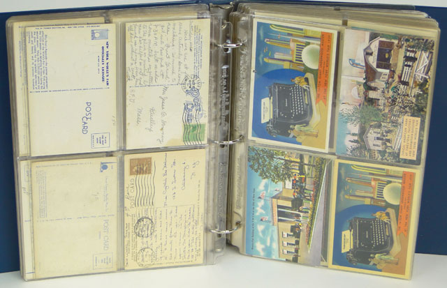 Lot of Approximately Two Hundred Seventy-Six (276)  1939 World's Fair New York Post Cards in Plastic Sleeves in a Binder Including Color and Black and White Images Published by The Albertype Company, Brooklyn, NY. Some have been written on but most are in