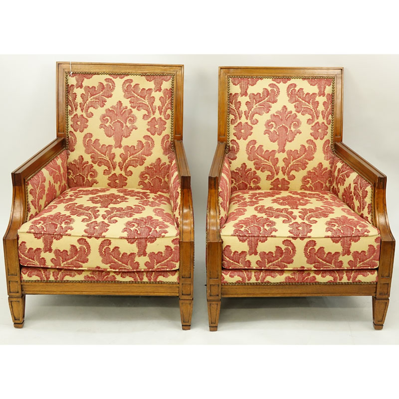 Pair of Carved Wood and Upholstered Directoire Bergeres. Some scuffs and scratches to wood, upholstery in good condition.
