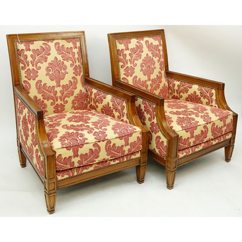 Pair of Carved Wood and Upholstered Directoire Bergeres. Minor rubbing and scuff to wood, upholstery in good condition.