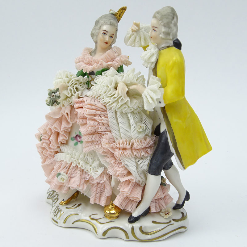 Dresden Porcelain Figural Group. Dresden back stamp on underside.