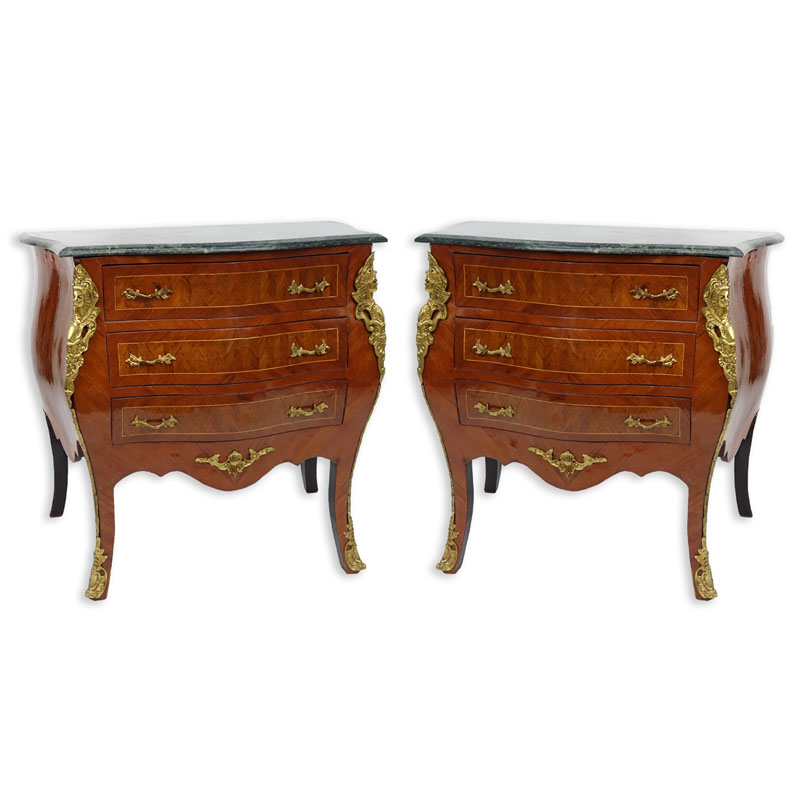 Pair of 20th Century Louis XVI Style Marquetry Inlaid and Gilt Bronze Mounted, Green Marble Top Night Stands/ Chest of Drawers. Serpentine form with three fitted drawers, gilt figures flaked at the corners, standing on tapering legs.