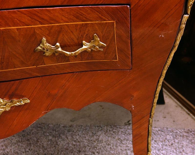 Pair of 20th Century Louis XVI Style Marquetry Inlaid and Gilt Bronze Mounted, Green Marble Top Night Stands/ Chest of Drawers. Serpentine form with three fitted drawers, gilt figures flaked at the corners, standing on tapering legs.