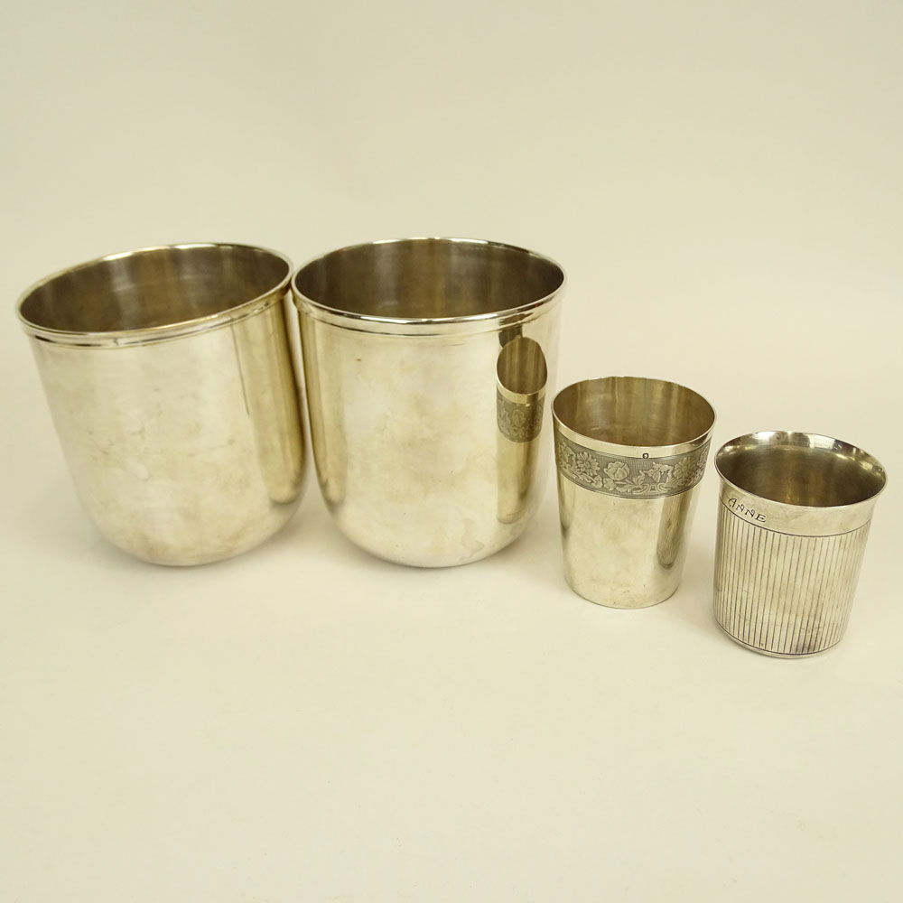 Lot of Four (4) Silver Plate Table Top Items. Includes two wine coolers 5-1/4", one Christofle tumbler 3", one Boulenger tumbler 3-1/2".