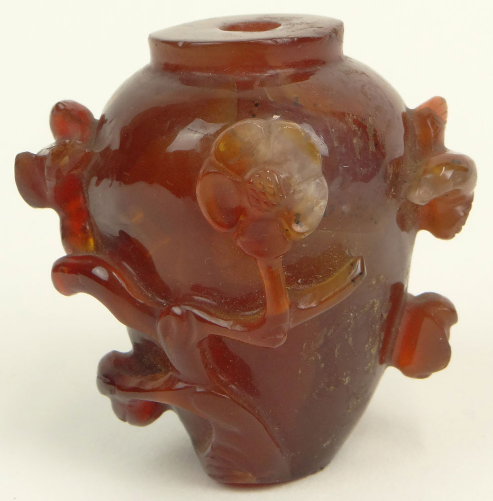 Chinese Relief Carved Carnelian Snuff Bottle. Unsigned.