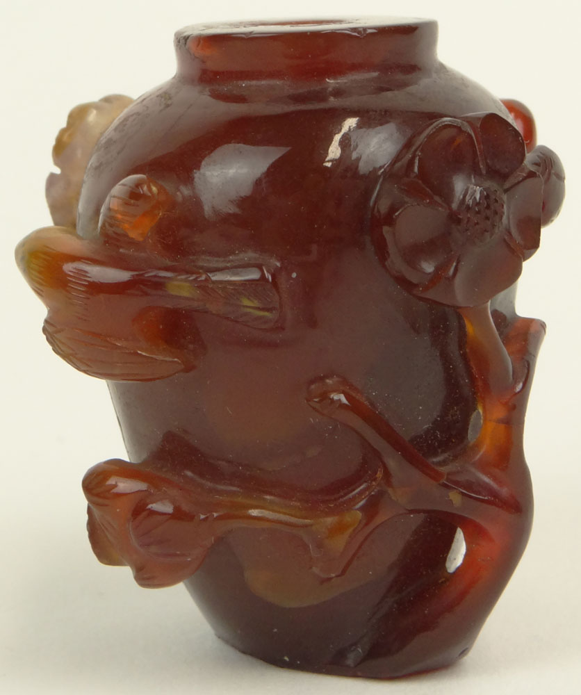 Chinese Relief Carved Carnelian Snuff Bottle. Unsigned.