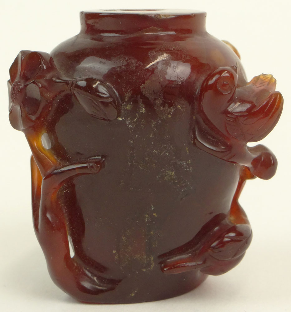 Chinese Relief Carved Carnelian Snuff Bottle. Unsigned.