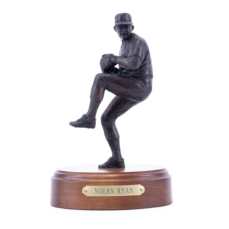 A Bronze Sculpture of Nolan Ryan Mounted on Wooden Base by Southland Art Castings. Includes original COA, Sticker label to base numbered 38/100, and tag inscribed "Nolan Ryan" to base.