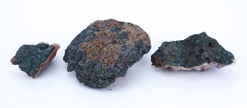 Three (3) Amethyst Geodes. Largest measures 4" H x 9" W.
