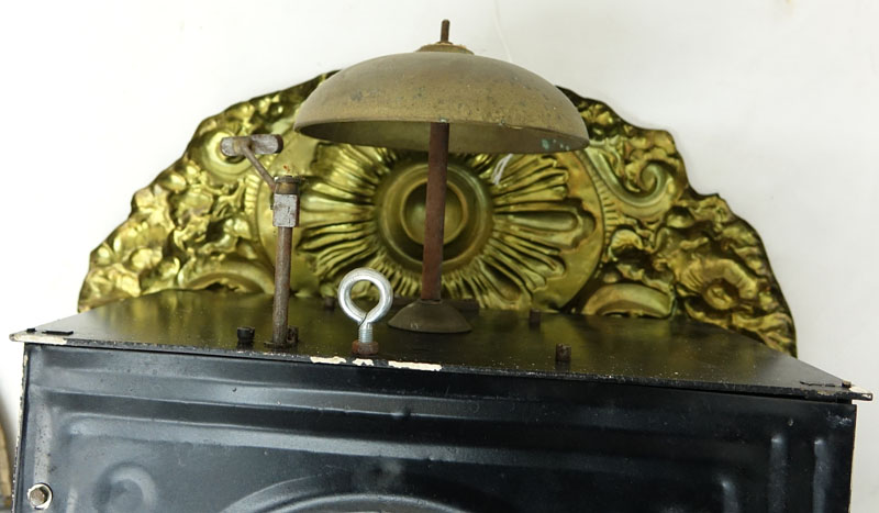 Antique French Brass High Relief Morbier Clock. Inscribed on dial with Roman numerals and decorative hands.