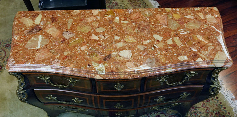 Mid 20th Century Regence Style Gilt Bronze Mounted Kingwood Marquetry Inlaid Marble Top Commode en Tombeau. Bronze foliage and figural form mounted accent with 5 front drawers.