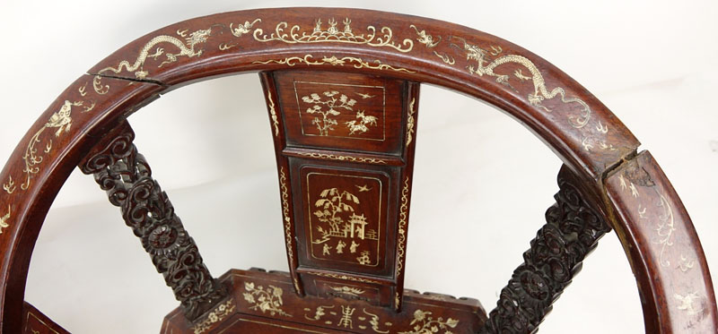 Pair of Chinese Carved Hardwood and Bone Inlay Horseshoe Armchairs. One chair has splits to armrest and missing panel on lower gallery, rubbing to veneer on both or else good condition.