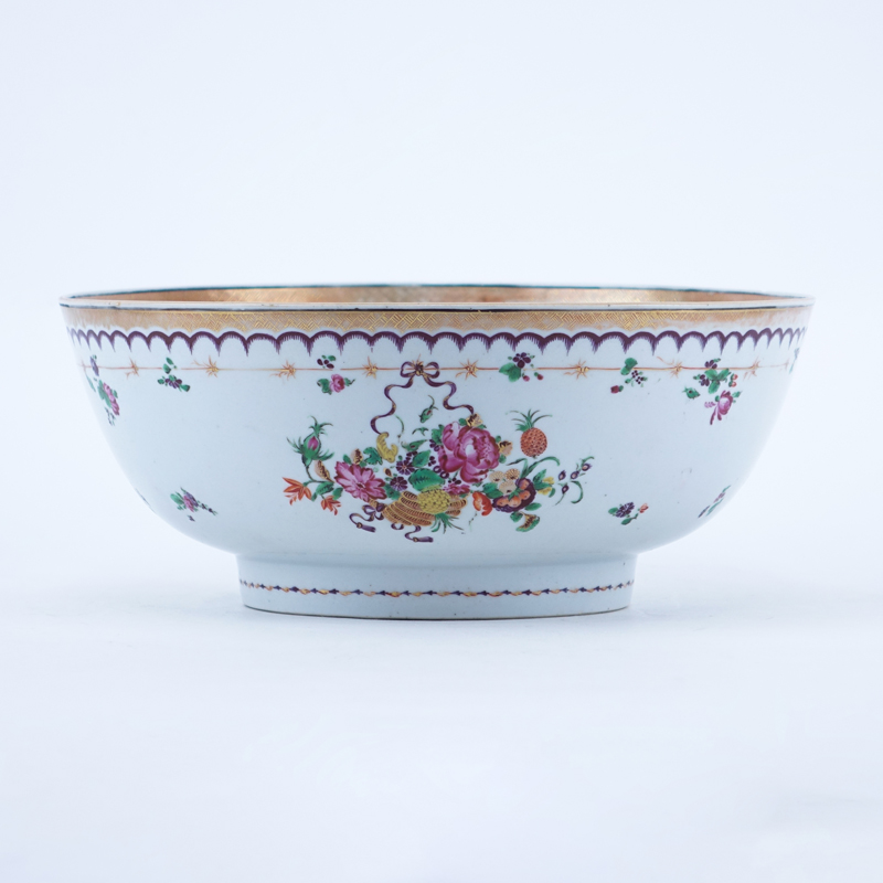 Early Chinese Export Pottery Bowl. Made for the European market and decorated with a floral motif.