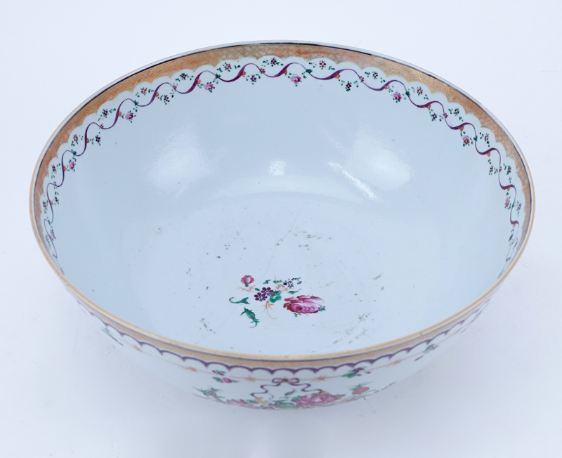 Early Chinese Export Pottery Bowl. Made for the European market and decorated with a floral motif.