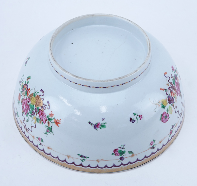 Early Chinese Export Pottery Bowl. Made for the European market and decorated with a floral motif.