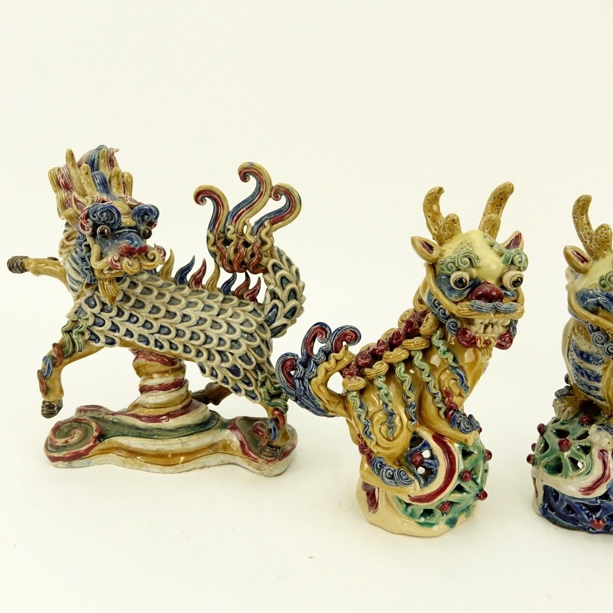 Four (4) Chinese Glazed Pottery Foo Dogs Figures