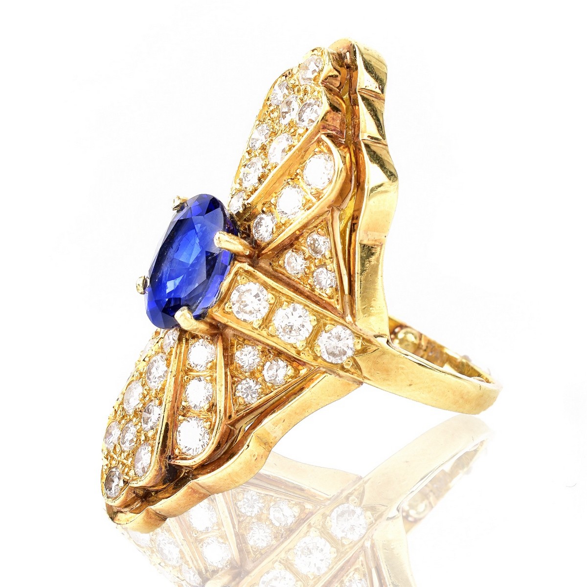 Sapphire, Diamond and 18K Gold Ring.