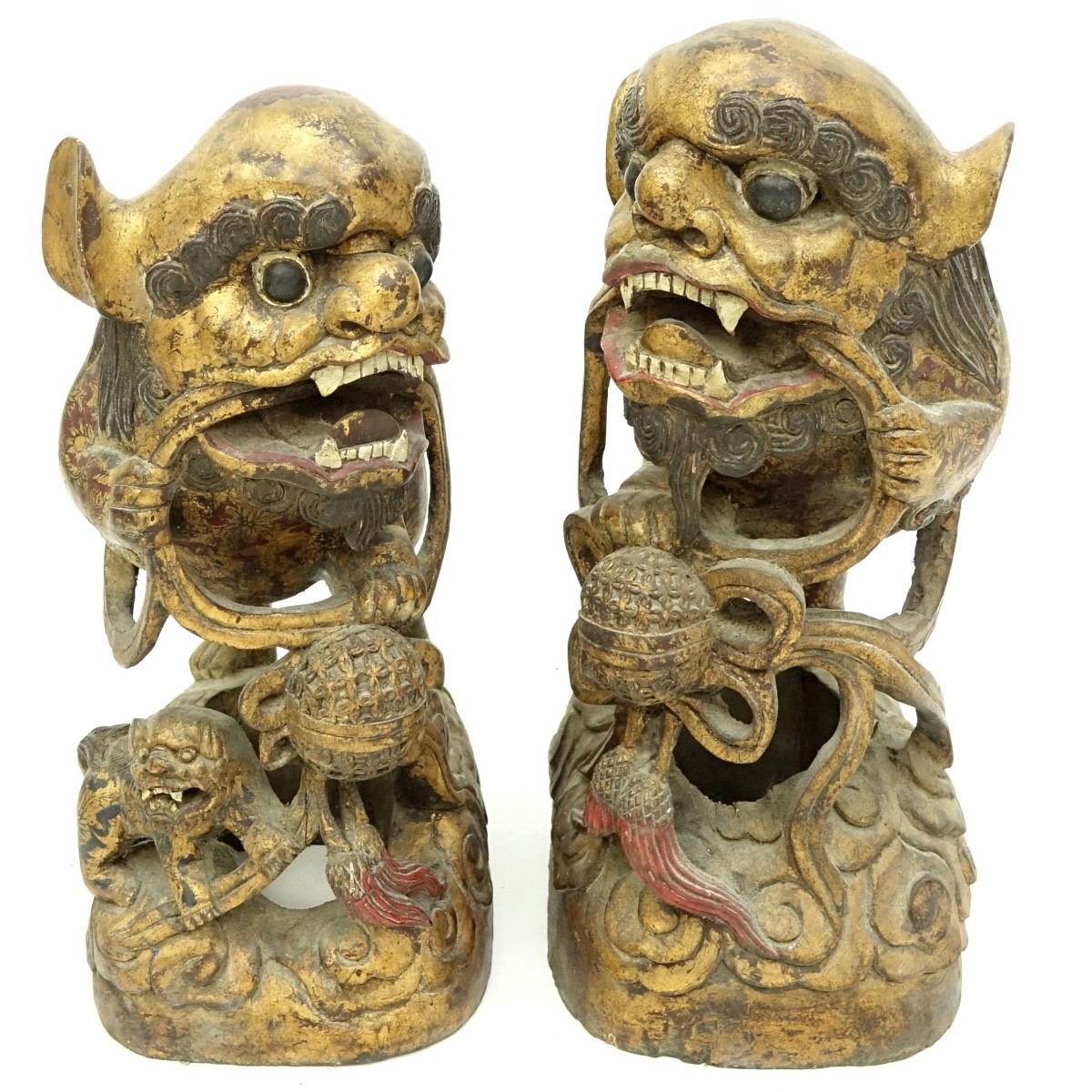 Pair of Large Chinese Gilt Wood Foo Dog Carvings