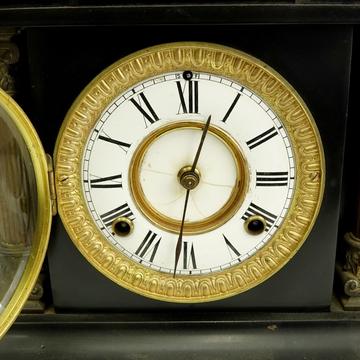 A Victorian Black Slate Mantle Clock