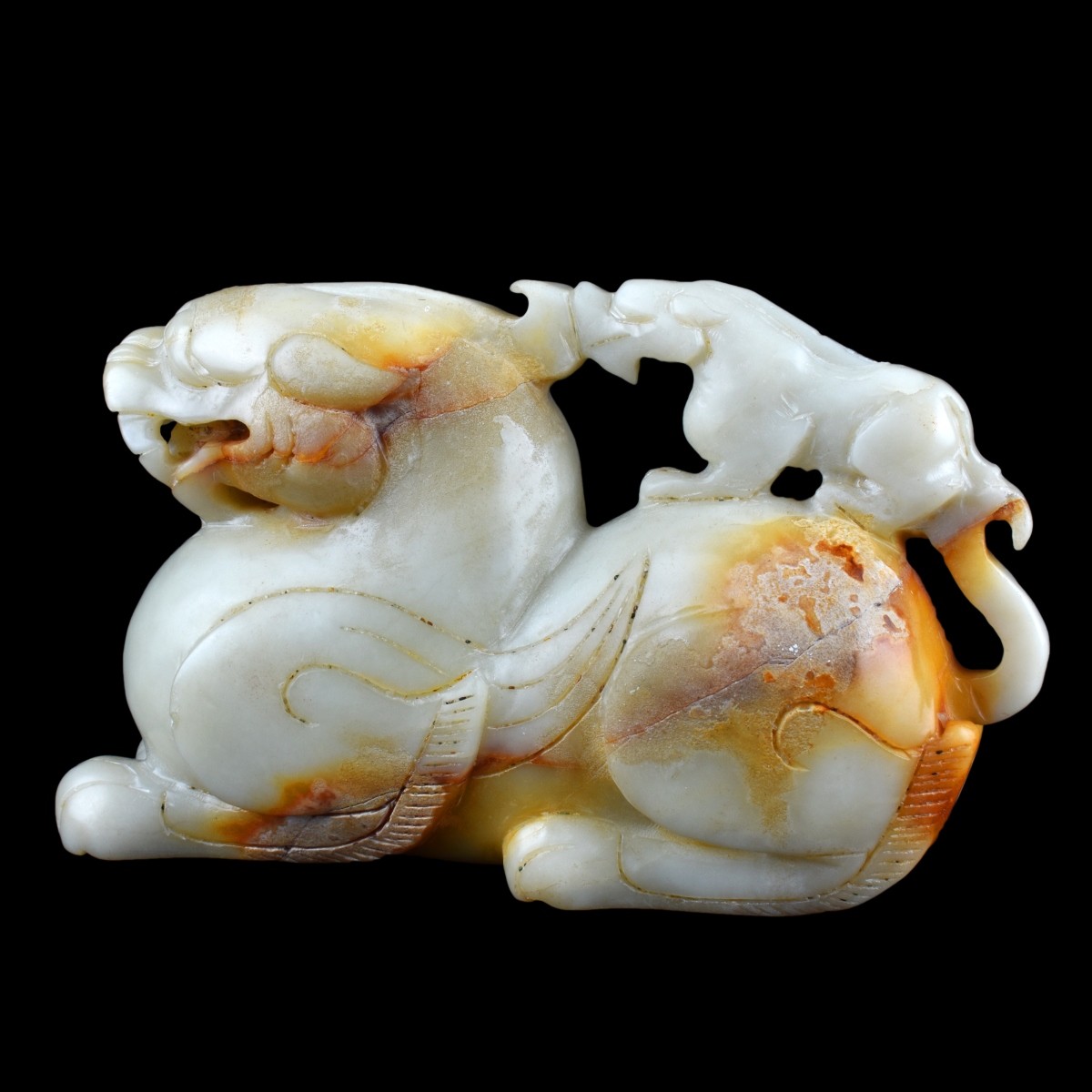 Two (2) Chinese Carved Jade Foo Dog Sculptures