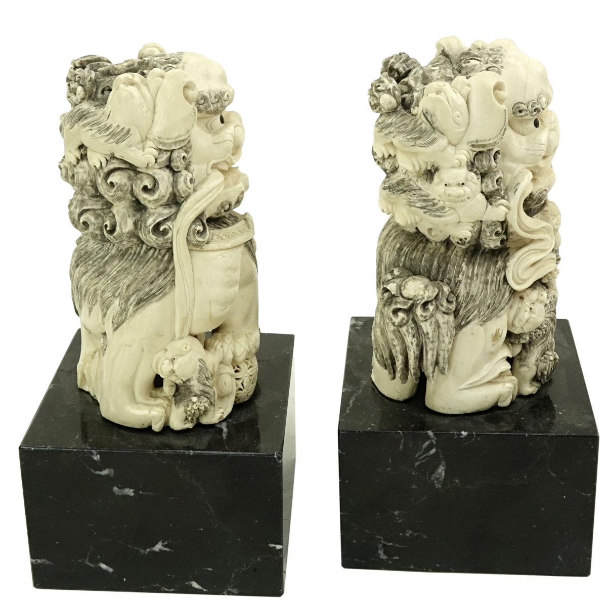 Pair of Chinese Carved Ivory Foo Dogs Figures