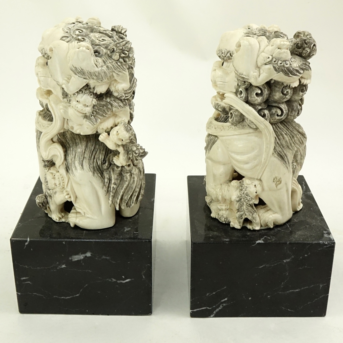 Pair of Chinese Carved Ivory Foo Dogs Figures