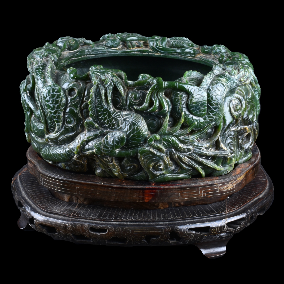 A Chinese Carved Spinach Jade Marriage Bowl