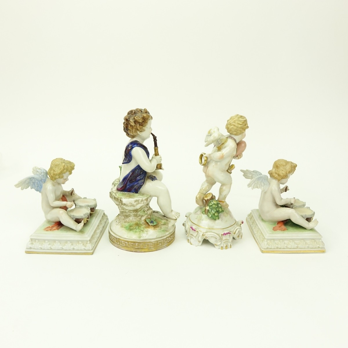 Grouping of Four (4) Antique Porcelain Figurines