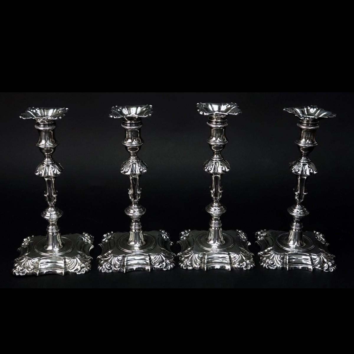 Four George II Period Sterling Silver Candlesticks