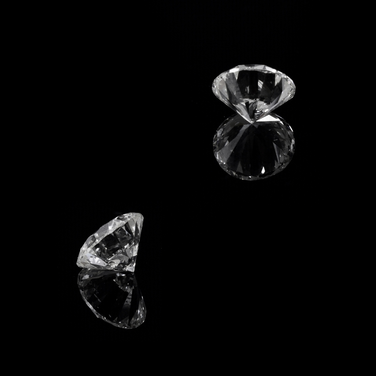 Two (2) GIA Certified 6.14ct TW Diamonds