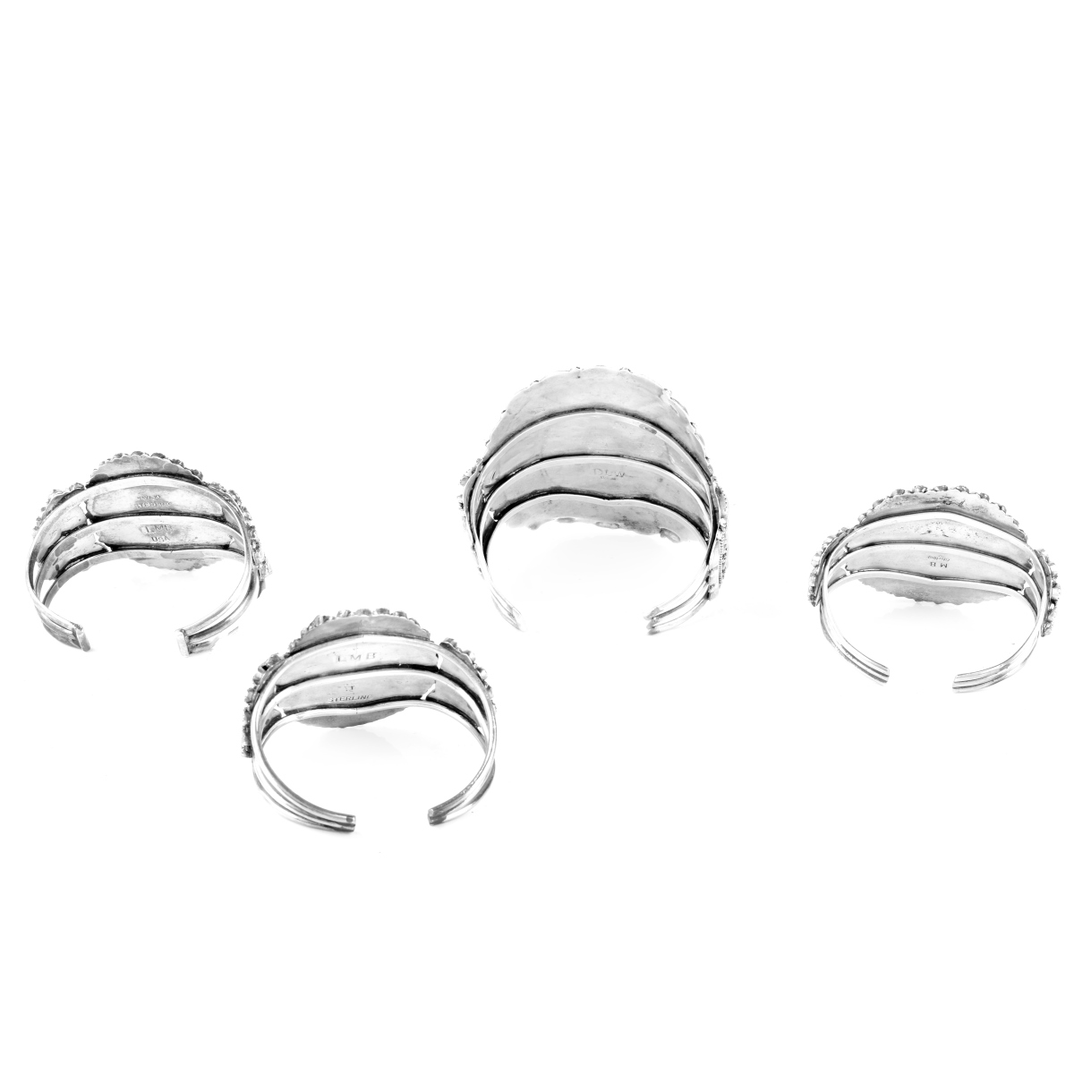 Four (4) Silver and Turquoise Cuff Bangles