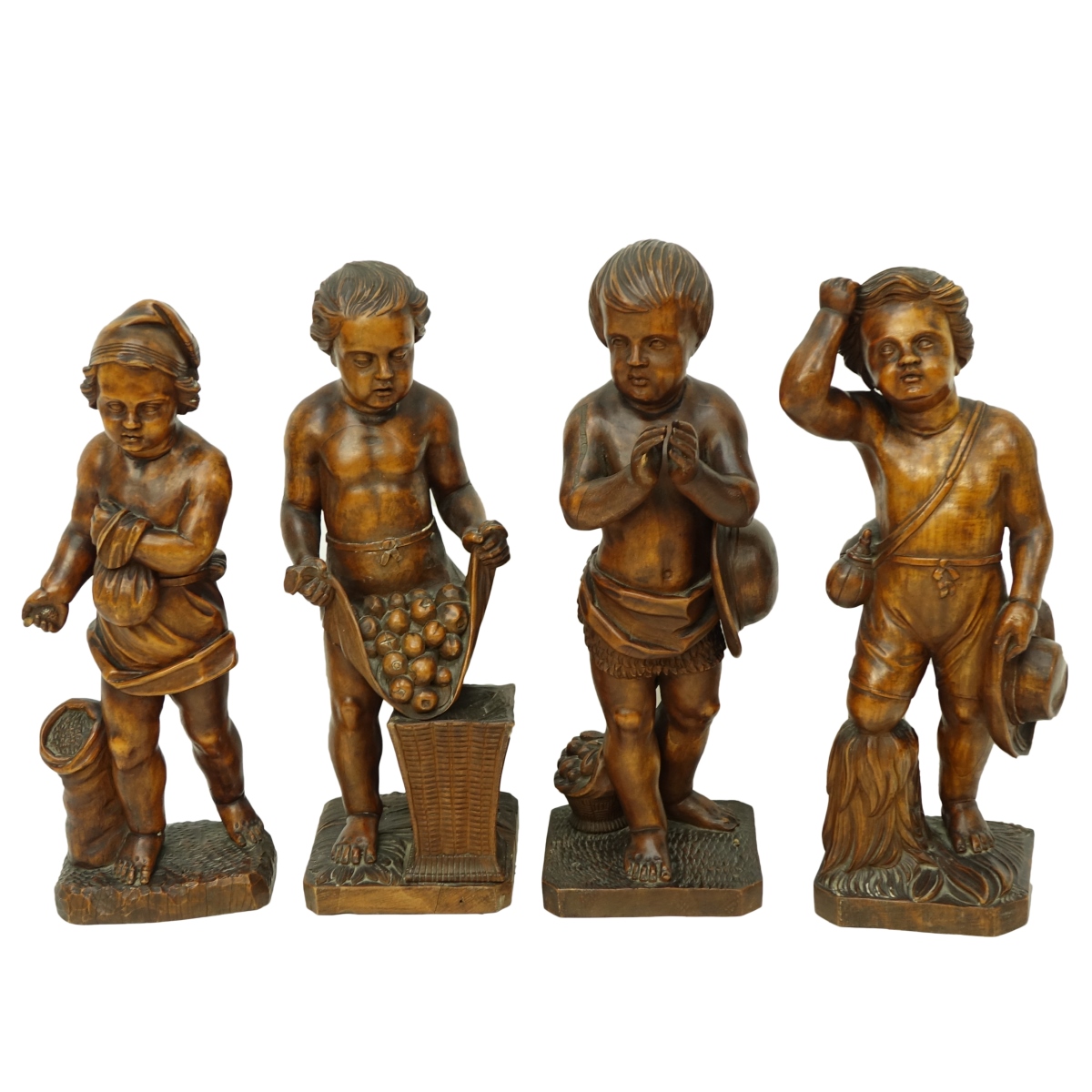 Four (4) Wood Carvings