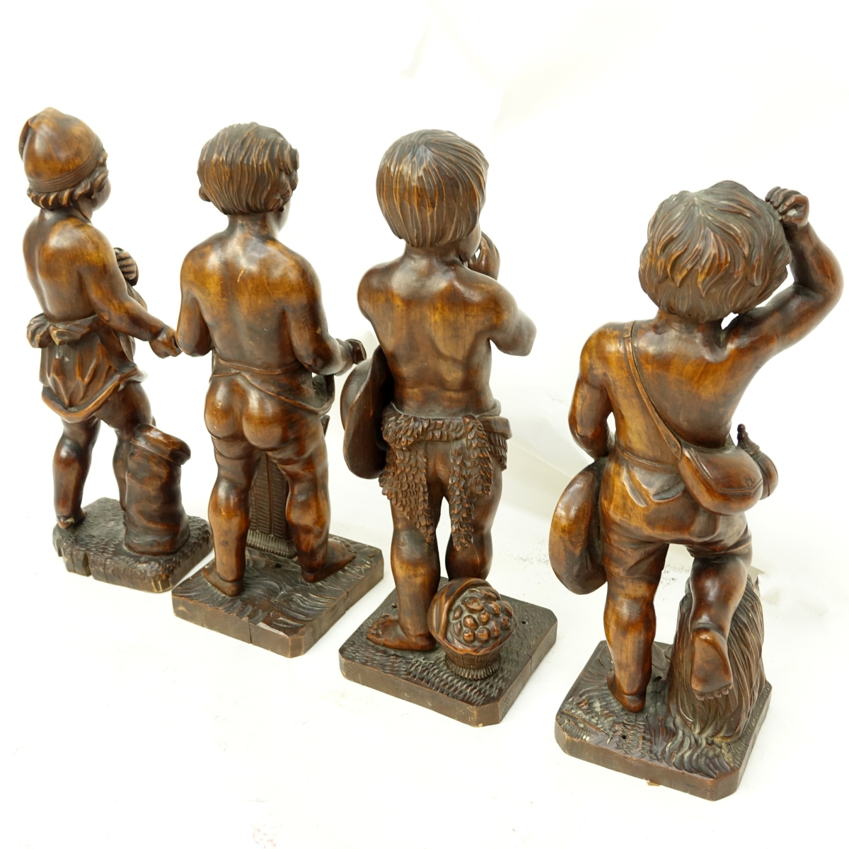 Four (4) Wood Carvings