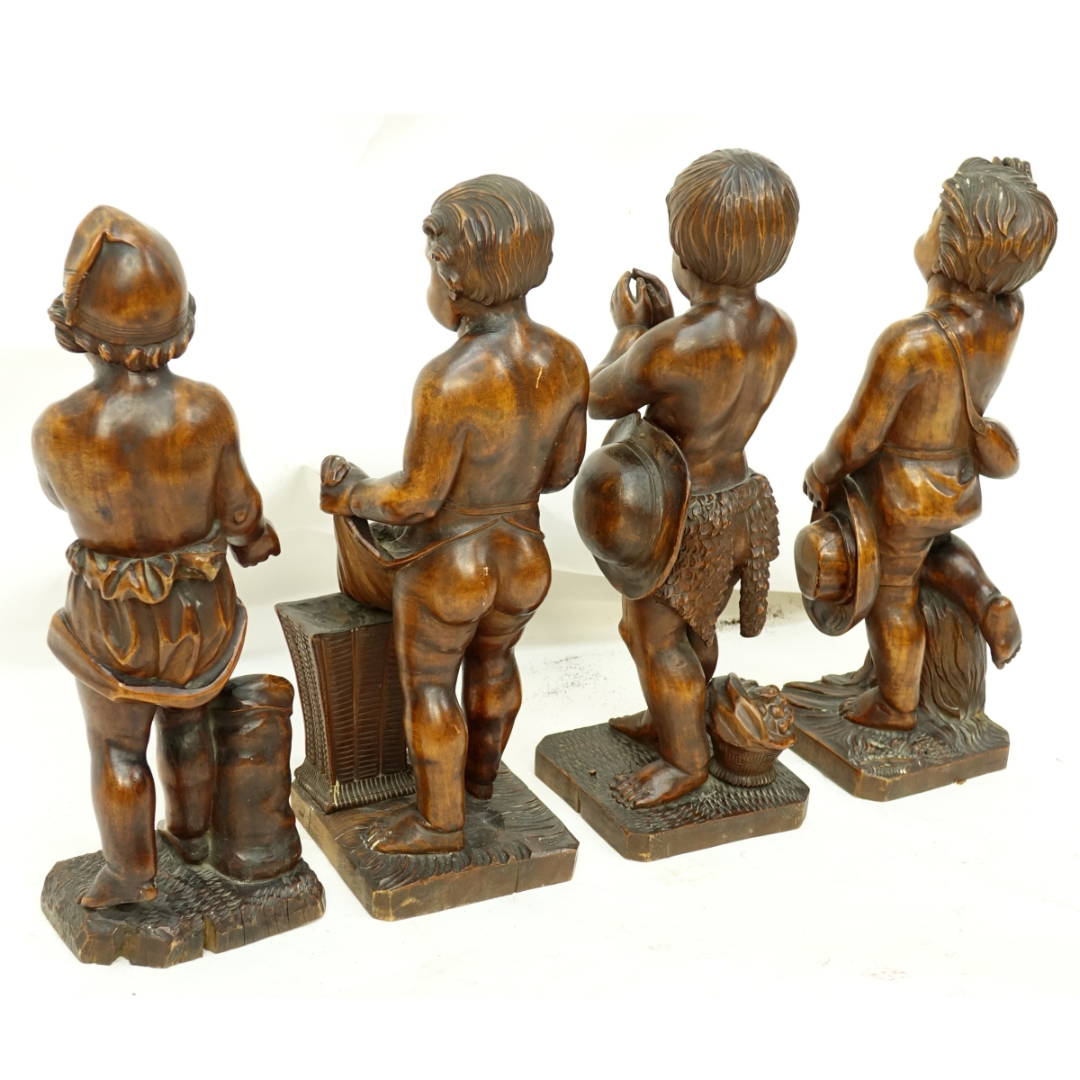 Four (4) Wood Carvings