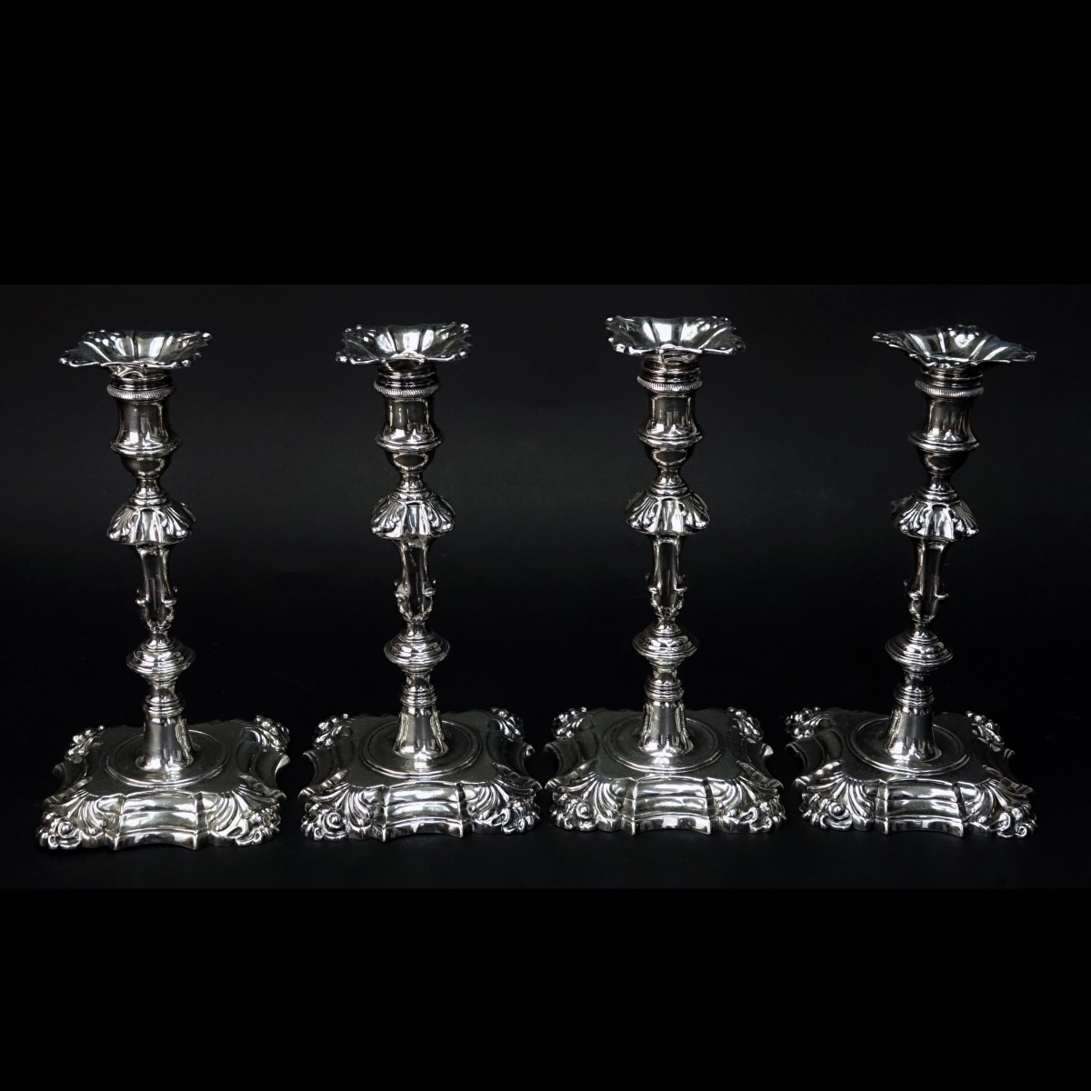 Four George II Silver Candlesticks