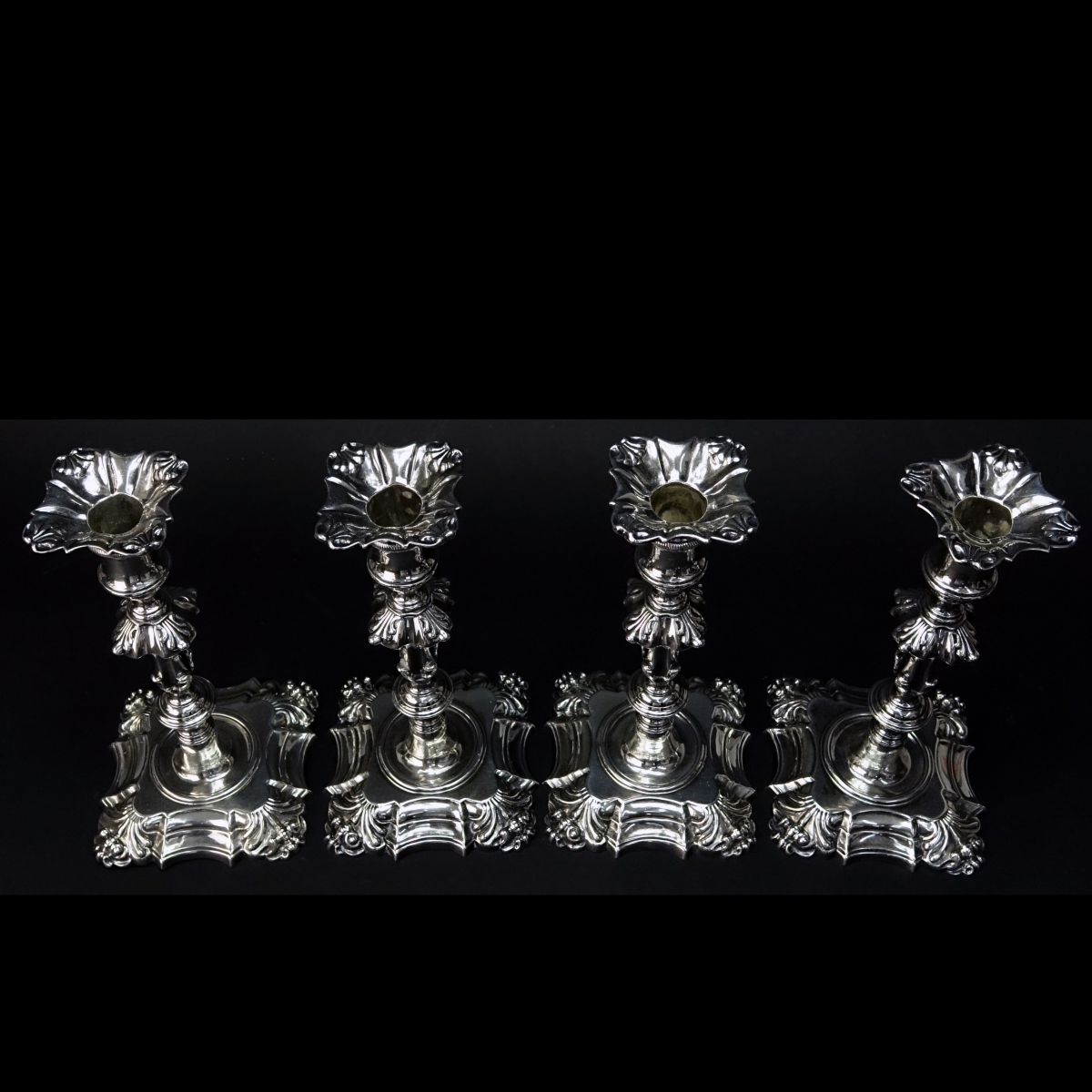 Four George II Silver Candlesticks