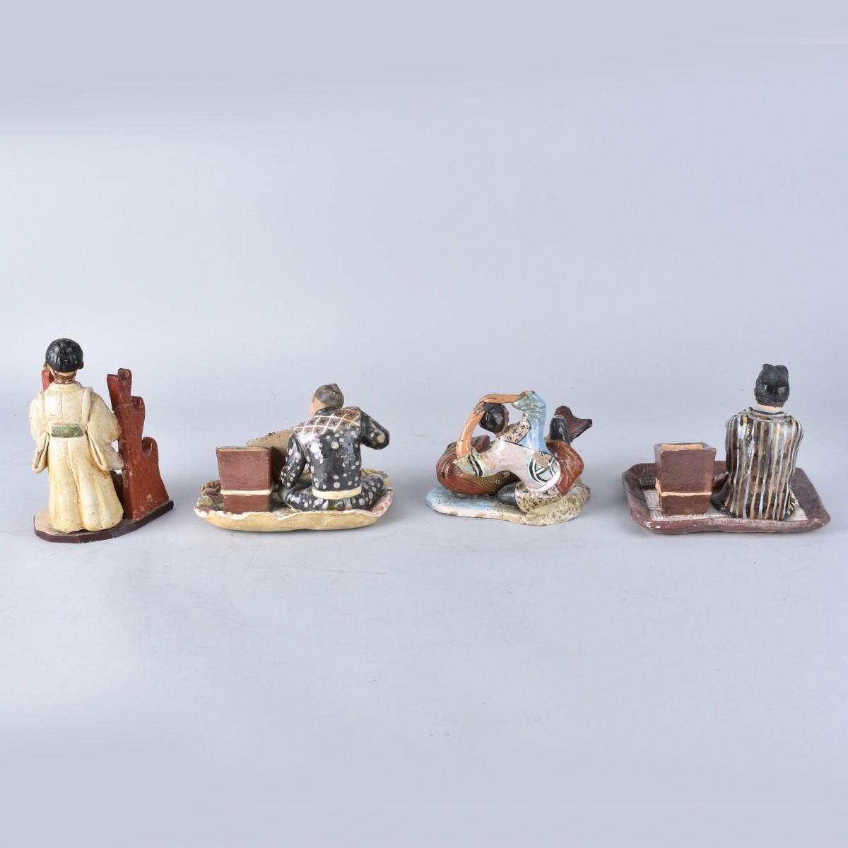 Four Japanese Pottery Figures