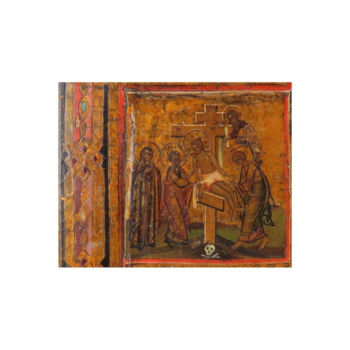 18th Century Russian Painted and Parcel Gilt Icon on Panel Depicting the Crucifixion of Christ. War